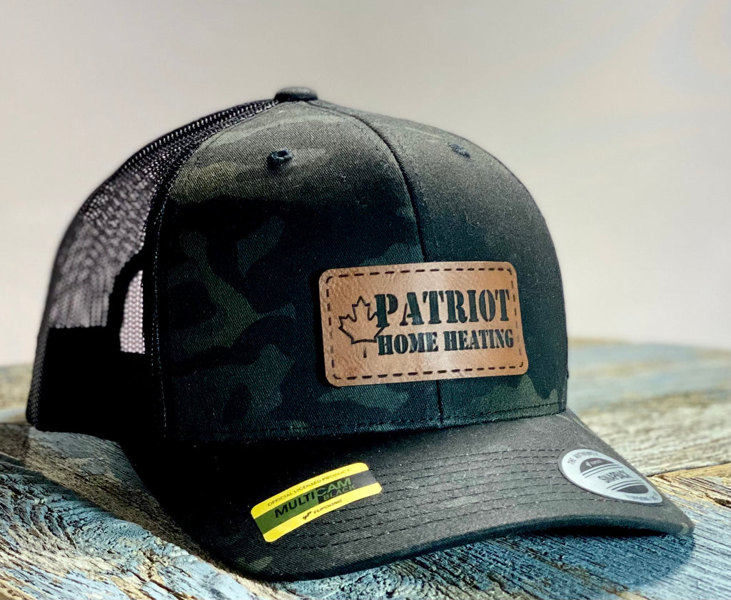 Hat with Patriot home heating logo on a faux leather patch.
